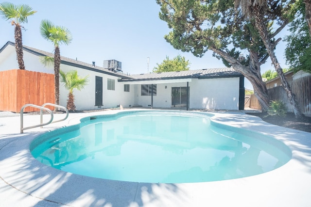 1617 W Indianapolis Ave, Fresno, CA 93705 - view of swimming pool with central AC and a patio area