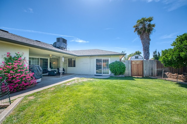 926 E Birch Ave, Fresno, CA 93720 - back of house with cooling unit, ceiling fan, a patio, and stucco siding