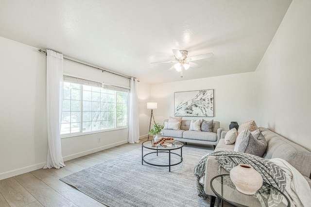 926 E Birch Ave, Fresno, CA 93720 - living area with ceiling fan, wood finished floors, and baseboards