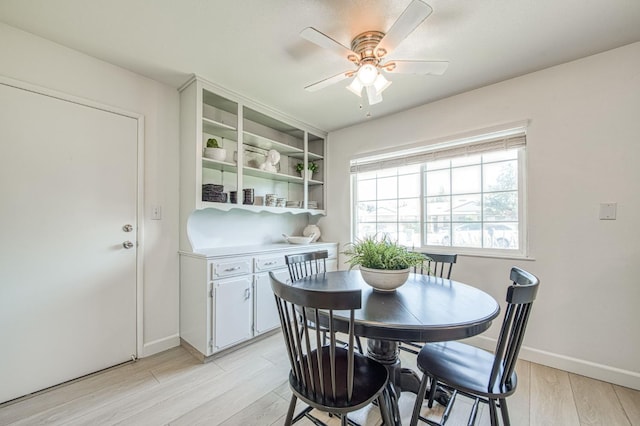 926 E Birch Ave, Fresno, CA 93720 - dining room featuring ceiling fan, light wood-style flooring, and baseboards