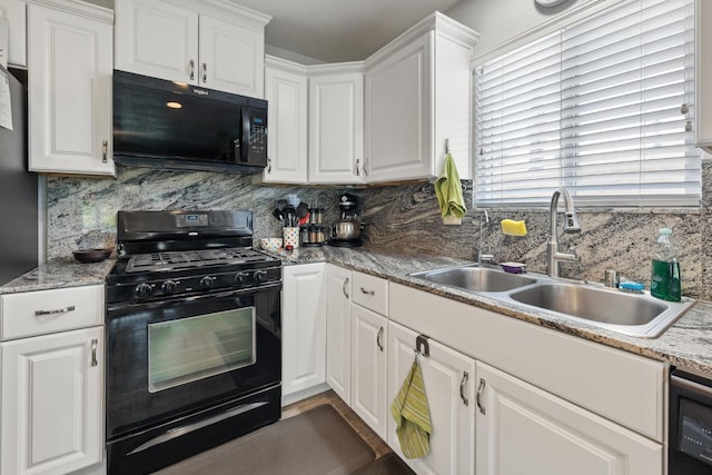 2141 Akers St, Visalia, CA 93277 - kitchen with black appliances, a sink, decorative backsplash, and white cabinetry