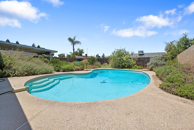2141 Akers St, Visalia, CA 93277 - view of swimming pool featuring a fenced backyard