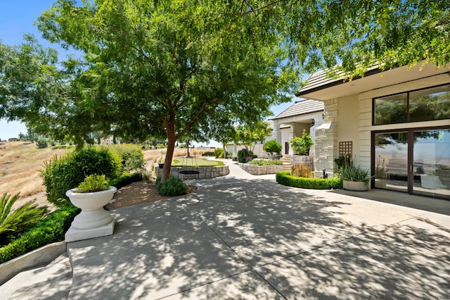 14215 Killarney Dr, Madera, CA 93636 - surrounding community featuring a patio