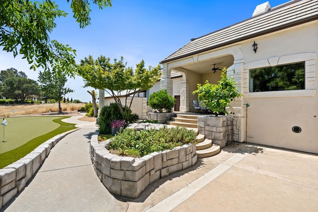 14215 Killarney Dr, Madera, CA 93636 - view of patio featuring an area to practice putting and a ceiling fan