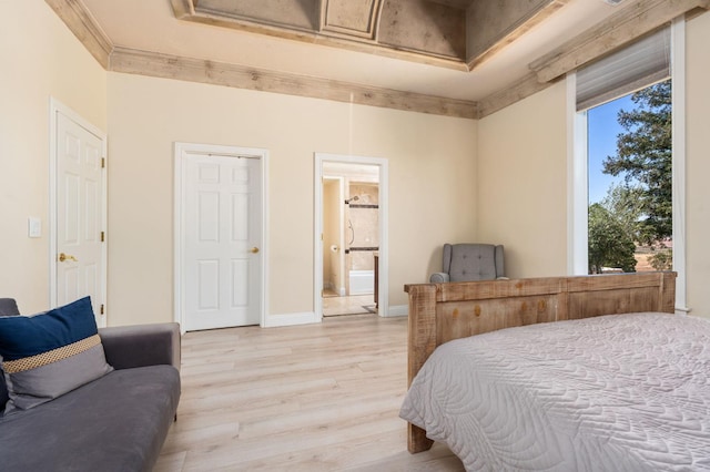 14215 Killarney Dr, Madera, CA 93636 - bedroom featuring light wood-style floors, ensuite bath, and baseboards