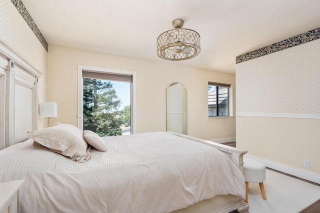 14215 Killarney Dr, Madera, CA 93636 - bedroom featuring baseboards and multiple windows