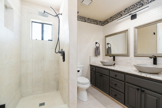 14215 Killarney Dr, Madera, CA 93636 - bathroom featuring toilet, double vanity, a stall shower, and tile patterned floors