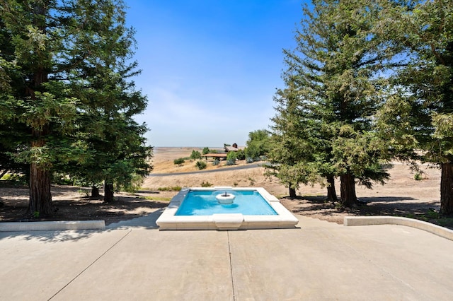 14215 Killarney Dr, Madera, CA 93636 - view of swimming pool featuring a patio area