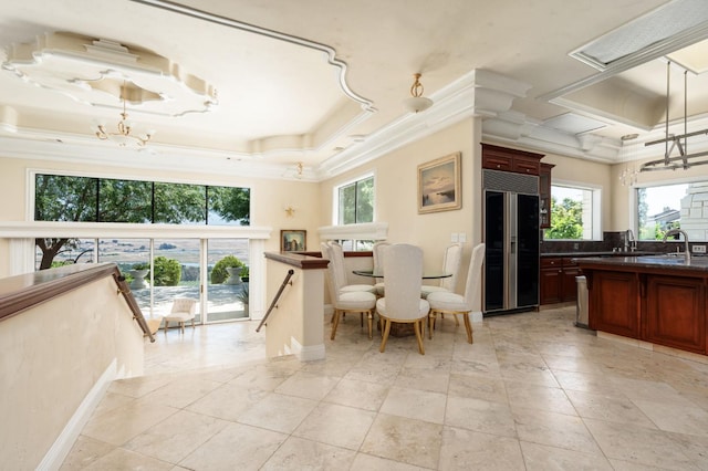 14215 Killarney Dr, Madera, CA 93636 - dining space with crown molding, a chandelier, and baseboards