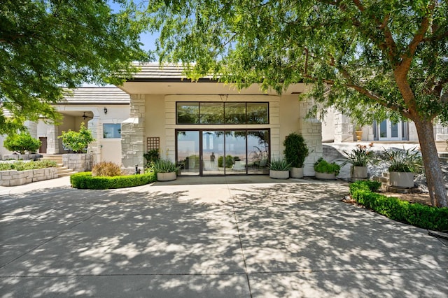 14215 Killarney Dr, Madera, CA 93636 - view of exterior entry with stone siding and stucco siding
