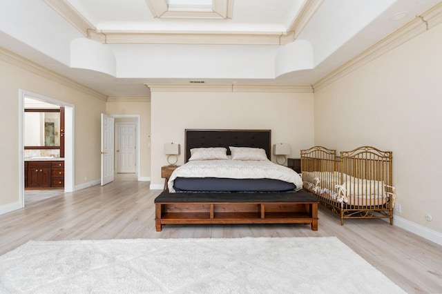 14215 Killarney Dr, Madera, CA 93636 - bedroom with wood finished floors, a tray ceiling, crown molding, and baseboards