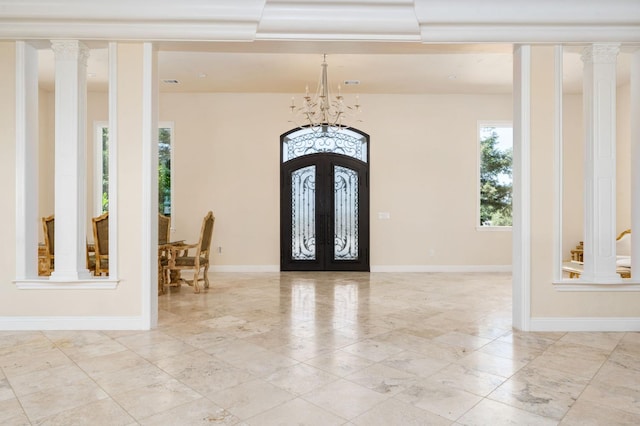 14215 Killarney Dr, Madera, CA 93636 - entryway featuring french doors, a chandelier, baseboards, and decorative columns