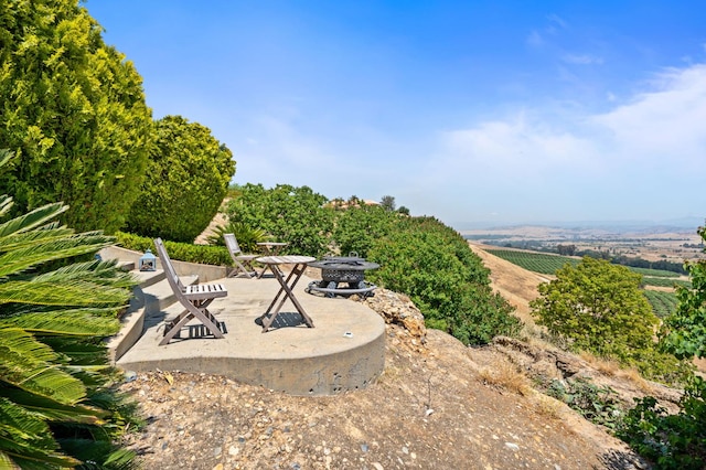 14215 Killarney Dr, Madera, CA 93636 - view of yard with an outdoor fire pit, a patio area, agricultural area, and a rural view