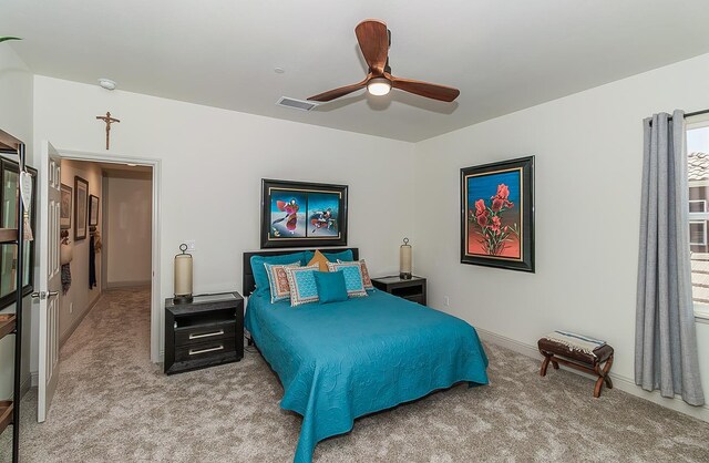 1523 N Ryan Ave, Clovis, CA 93619 - bedroom with light carpet, ceiling fan, and baseboards