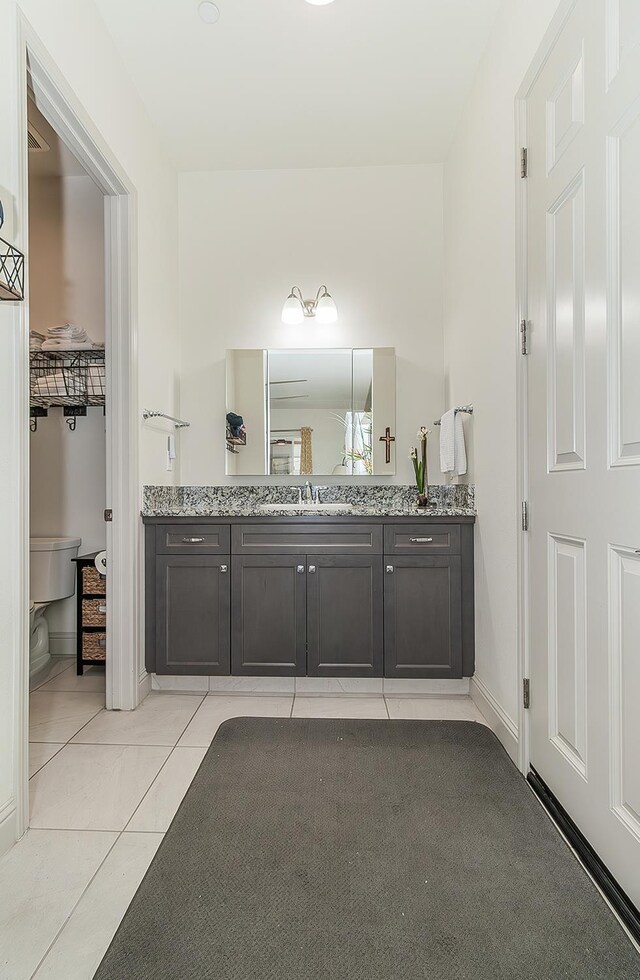 1523 N Ryan Ave, Clovis, CA 93619 - bathroom featuring vanity and toilet