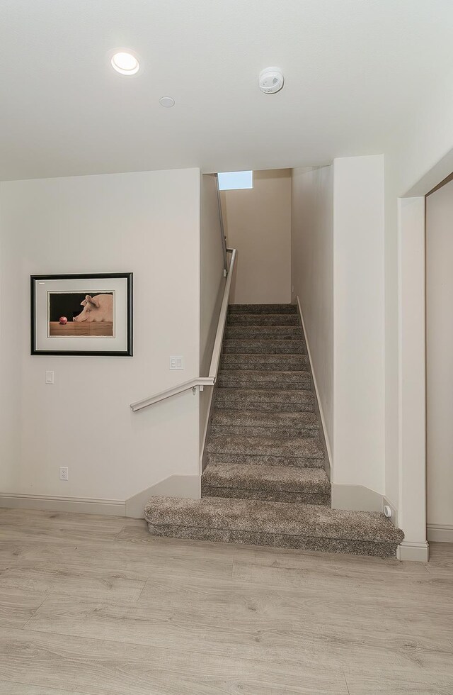 1523 N Ryan Ave, Clovis, CA 93619 - stairway with wood finished floors, baseboards, and recessed lighting