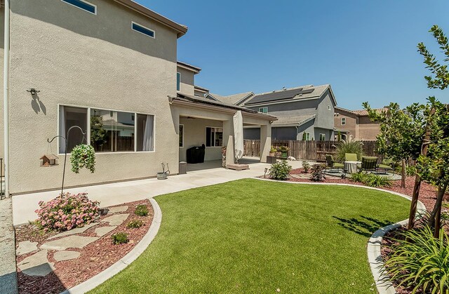 1523 N Ryan Ave, Clovis, CA 93619 - back of property featuring a patio area and stucco siding