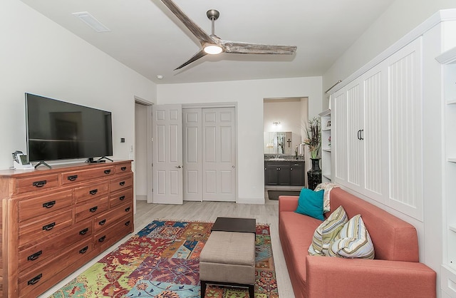 1523 N Ryan Ave, Clovis, CA 93619 - living room featuring light wood finished floors and a ceiling fan