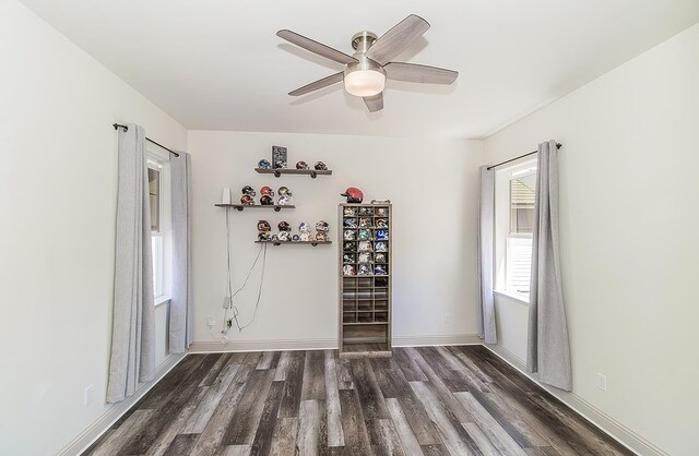 1523 N Ryan Ave, Clovis, CA 93619 - spare room with wood finished floors, a ceiling fan, and baseboards
