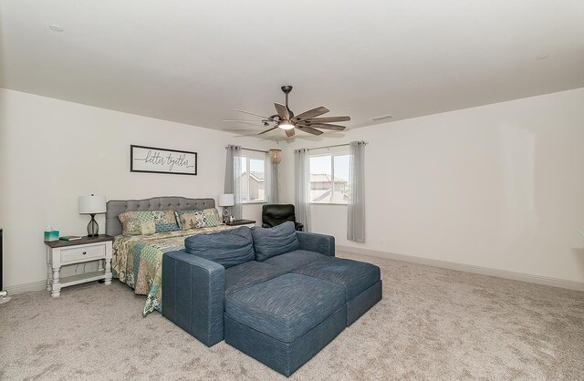 1523 N Ryan Ave, Clovis, CA 93619 - bedroom featuring light carpet, baseboards, and ceiling fan
