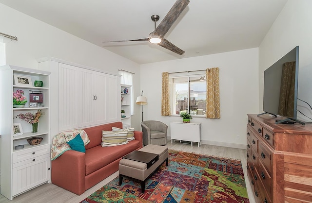 1523 N Ryan Ave, Clovis, CA 93619 - living room featuring light wood-style flooring and ceiling fan