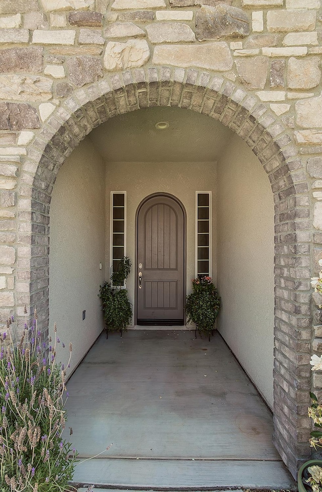 1523 N Ryan Ave, Clovis, CA 93619 - view of exterior entry featuring stone siding and stucco siding