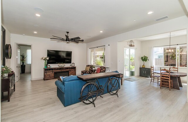 1523 N Ryan Ave, Clovis, CA 93619 - living room with light wood-type flooring, recessed lighting, a ceiling fan, and baseboards
