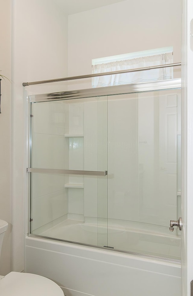 1523 N Ryan Ave, Clovis, CA 93619 - bathroom with toilet and combined bath / shower with glass door