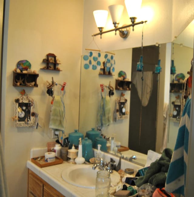 43379 Leach Rd, Ahwahnee, CA 93601 - bathroom with vanity and a chandelier