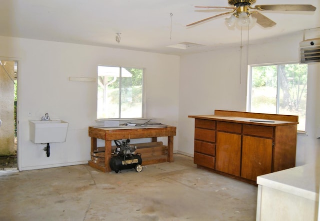 43379 Leach Rd, Ahwahnee, CA 93601 - bathroom with concrete flooring, healthy amount of natural light, ceiling fan, and a sink
