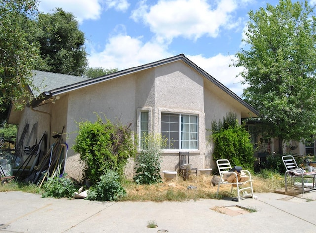 43379 Leach Rd, Ahwahnee, CA 93601 - view of home's exterior featuring stucco siding and a patio