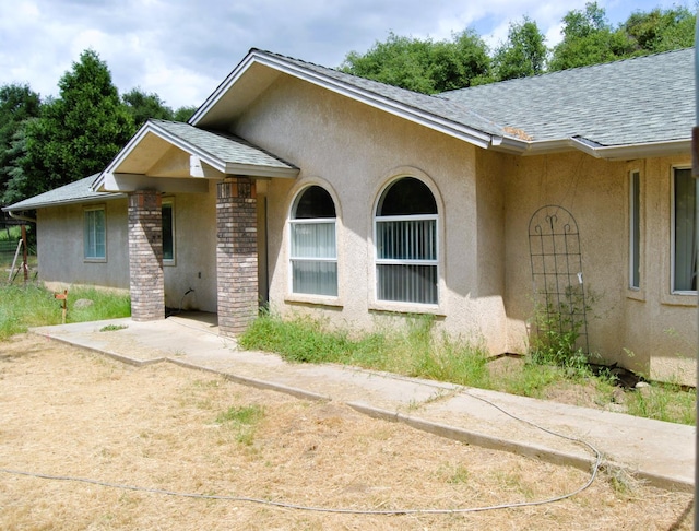 43379 Leach Rd, Ahwahnee, CA 93601 - view of front of property featuring stucco siding and roof with shingles
