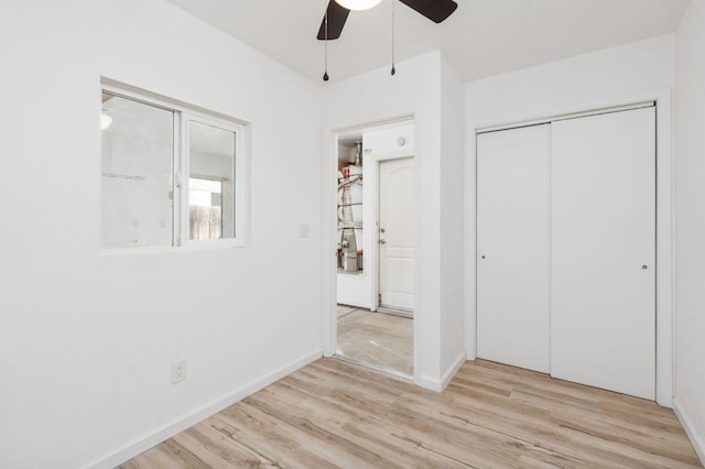 8574 N Heartland Way, Fresno, CA 93720 - unfurnished bedroom featuring light wood finished floors, baseboards, a closet, and ceiling fan