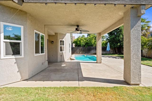8574 N Heartland Way, Fresno, CA 93720 - fenced backyard featuring a ceiling fan and a patio