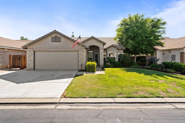 8574 N Heartland Way, Fresno, CA 93720 - view of front of property featuring stone siding, an attached garage, stucco siding, and concrete driveway