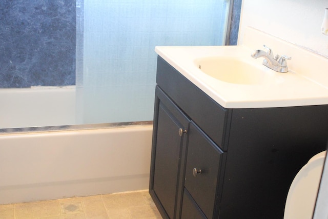 4657 E Hamilton Ave, Fresno, CA 93702 - bathroom featuring vanity and washtub / shower combination