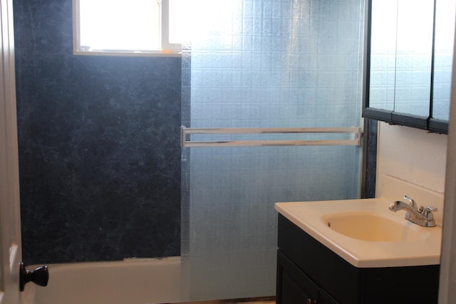4657 E Hamilton Ave, Fresno, CA 93702 - bathroom with vanity and bathing tub / shower combination