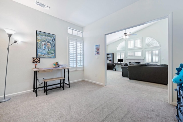 2871 E Ryan Ln, Fresno, CA 93720 - carpeted home office with healthy amount of natural light, a ceiling fan, lofted ceiling, baseboards, and a fireplace