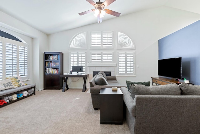 2871 E Ryan Ln, Fresno, CA 93720 - living area with a ceiling fan, light carpet, a desk, baseboards, and high vaulted ceiling