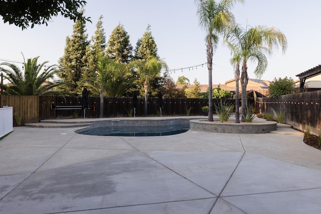 2176 E Pinehurst Ave, Fresno, CA 93730 - view of swimming pool featuring a patio area and a fenced backyard