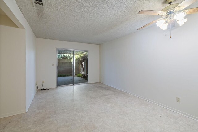1709 W Calimyrna Ave Unit B, Fresno, CA 93711 - unfurnished room featuring a textured ceiling, ceiling fan, and light flooring