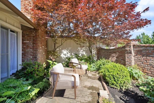 1709 W Calimyrna Ave Unit B, Fresno, CA 93711 - fenced backyard with a patio