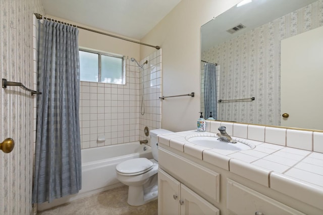 1709 W Calimyrna Ave Unit B, Fresno, CA 93711 - full bathroom featuring vanity, shower / bath combo, toilet, and tile patterned floors