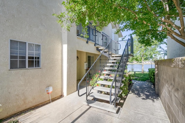 1542 E Alluvial Ave Unit 224, Fresno, CA 93720 - view of patio / terrace featuring stairs