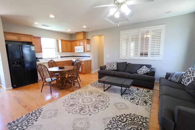 2143 Everglade Ave, Clovis, CA 93619 - living area featuring a ceiling fan, light wood-type flooring, and recessed lighting