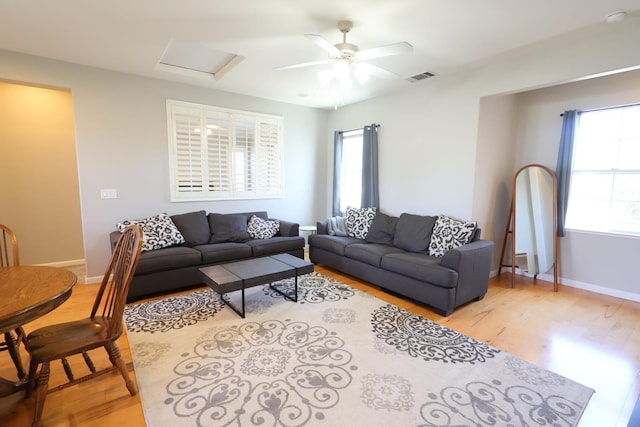 2143 Everglade Ave, Clovis, CA 93619 - living area featuring light wood-type flooring, attic access, a ceiling fan, and baseboards