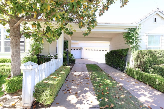 2143 Everglade Ave, Clovis, CA 93619 - view of front of home featuring concrete driveway and a garage