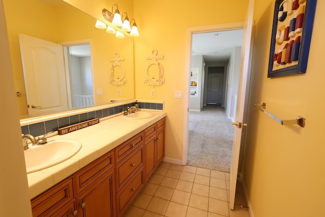 2143 Everglade Ave, Clovis, CA 93619 - full bathroom with double vanity, baseboards, and tile patterned floors