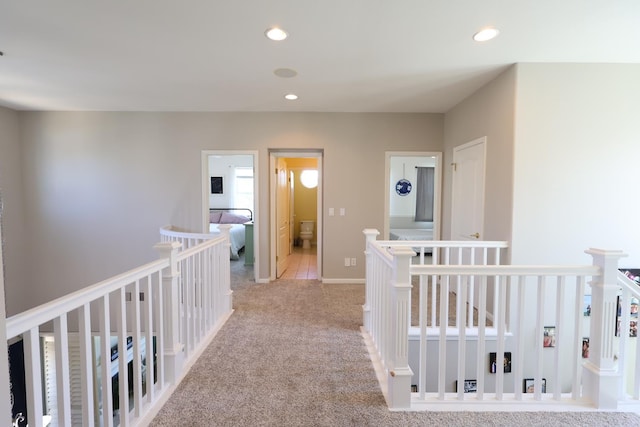 2143 Everglade Ave, Clovis, CA 93619 - hall featuring an upstairs landing, light carpet, and recessed lighting