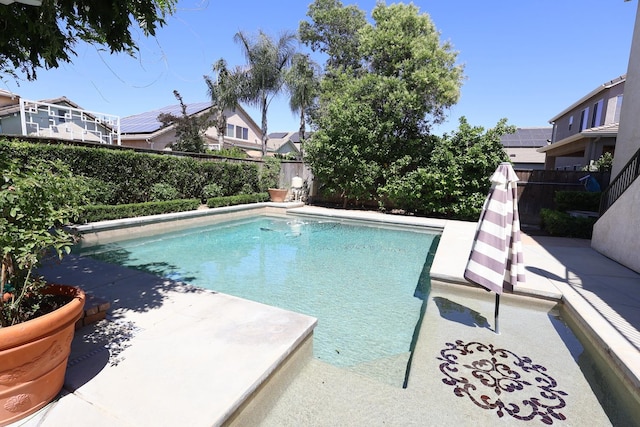 2143 Everglade Ave, Clovis, CA 93619 - view of swimming pool with a fenced backyard